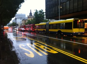 waiting for a bus in the rain