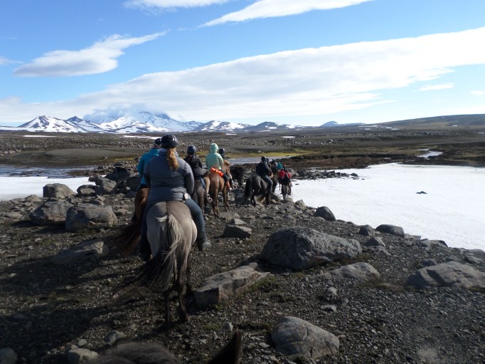 riding past snow towards Snaefell