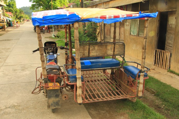 a tri-cycle, aka the Philippino taxi
