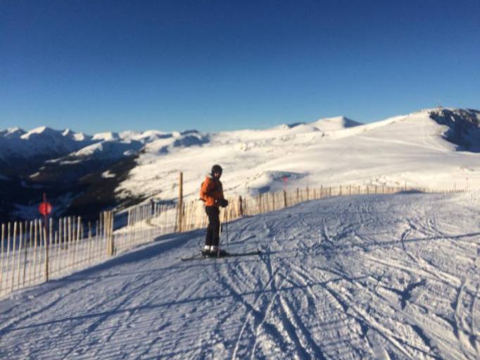 skiing under clear skies