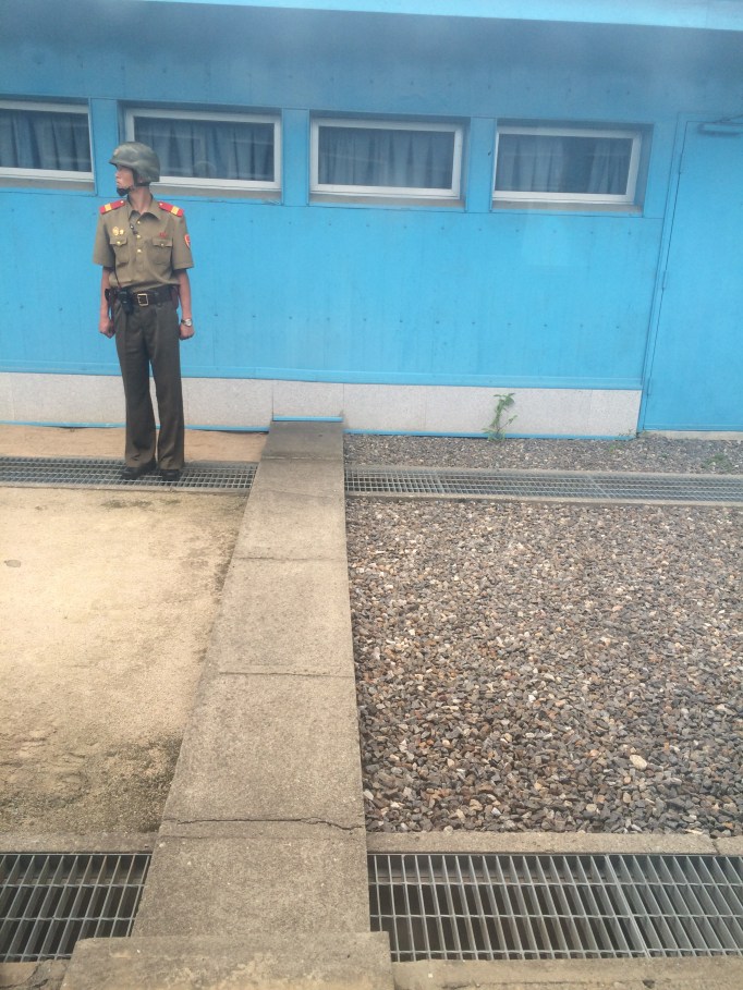 on the border between North and South Korea, which is literally that concrete line