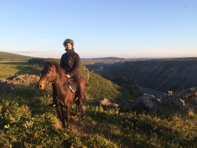 a rider poses over Jökulsá á fjöllum glacier river